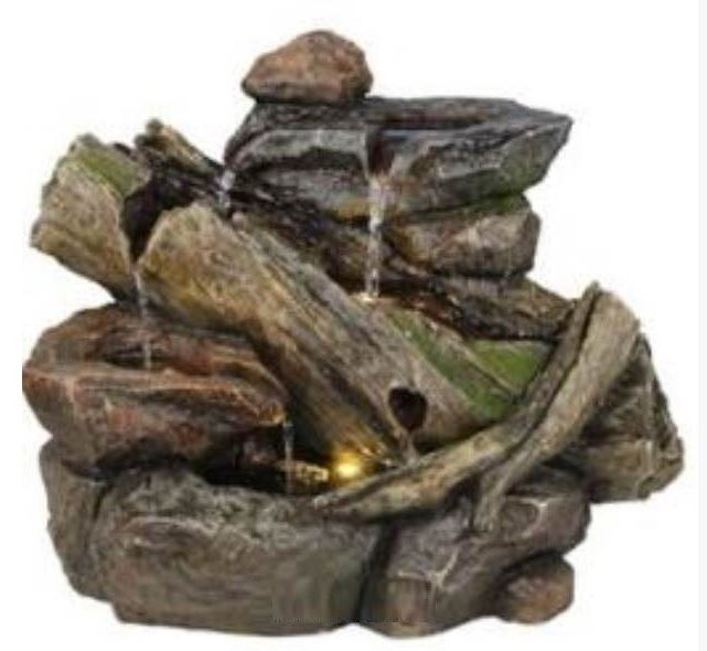 מפל מים לגינה דמוי אבן ועץ טבעי מפל מים לגינה דמוי אבן ועץ טבעי